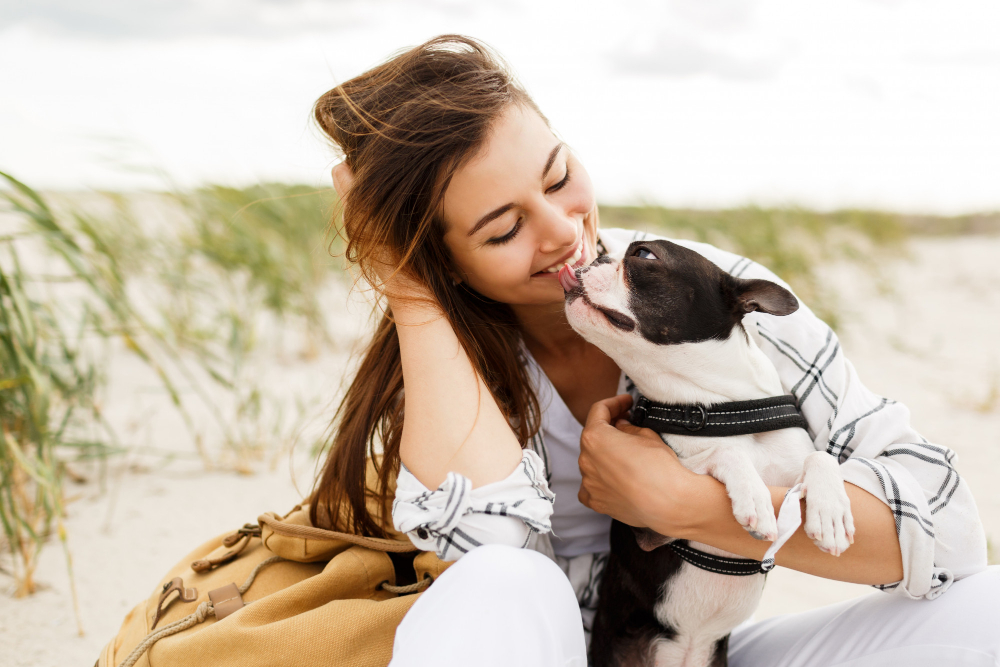 woman with happy Boston Terrier